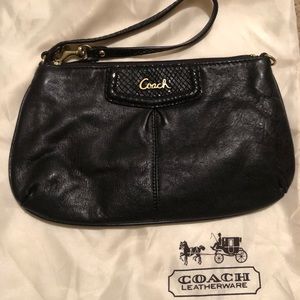 Coach clutch with wristlet